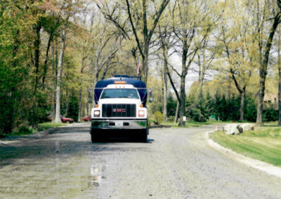 Dust Control Truck on Gravel Haul Road