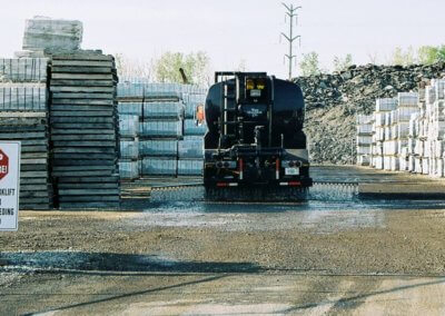 A Gasaway Maintenance Company truck providing dust control at a work site in Waukegan, IL.