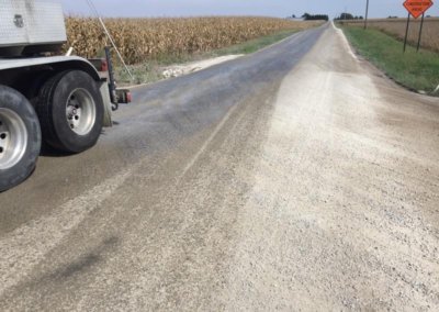 Calcium Chloride application on rural gravel road for dust control