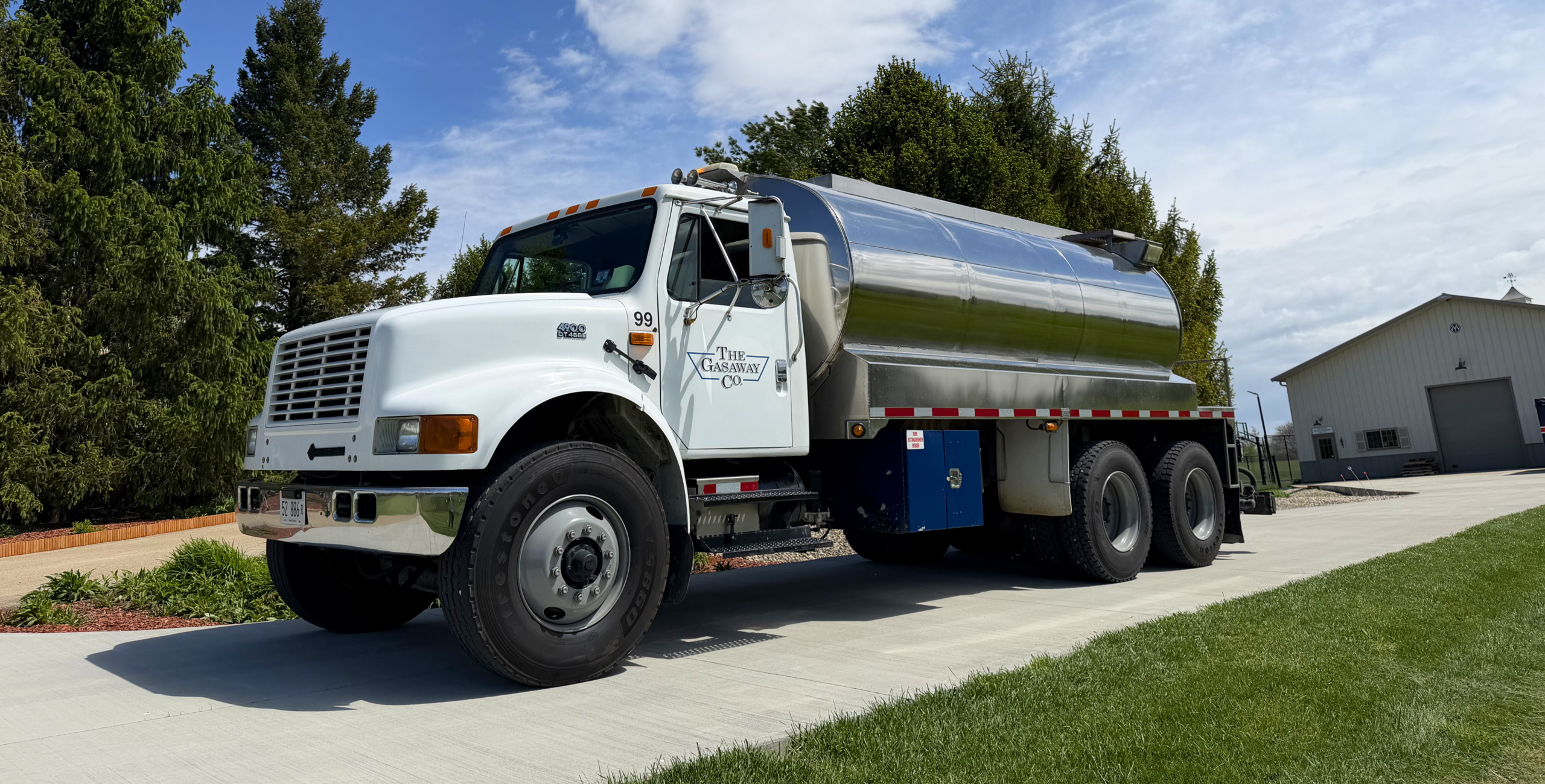 A Gasaway Maintenance Company water truck parked on a sunny day.