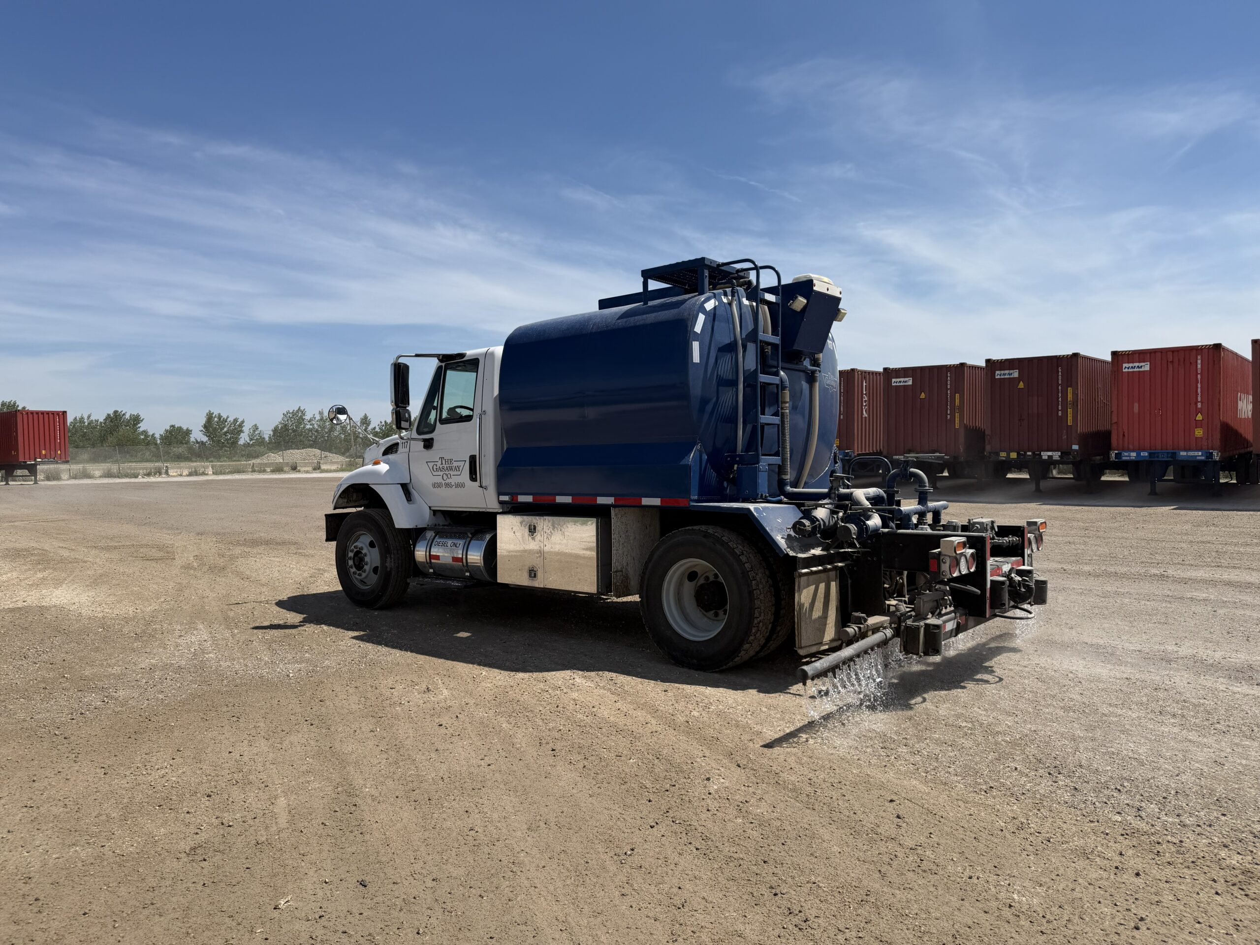 A Gasaway Maintenance Company smaller truck applying dust control at an intermodal facility in Joliet, IL.